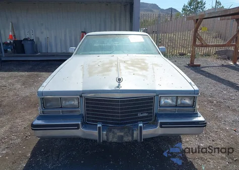 1985 Cadillac Seville z USA, uszkodzony, nr VIN 1G6KS698XFE804240